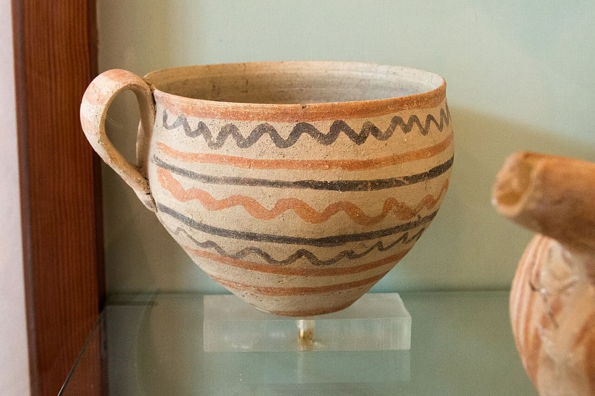 History of Milos: a painted Bronze Age cup from Phylakopi with wavy red and black bands, in the Archaeological Museum of Milos