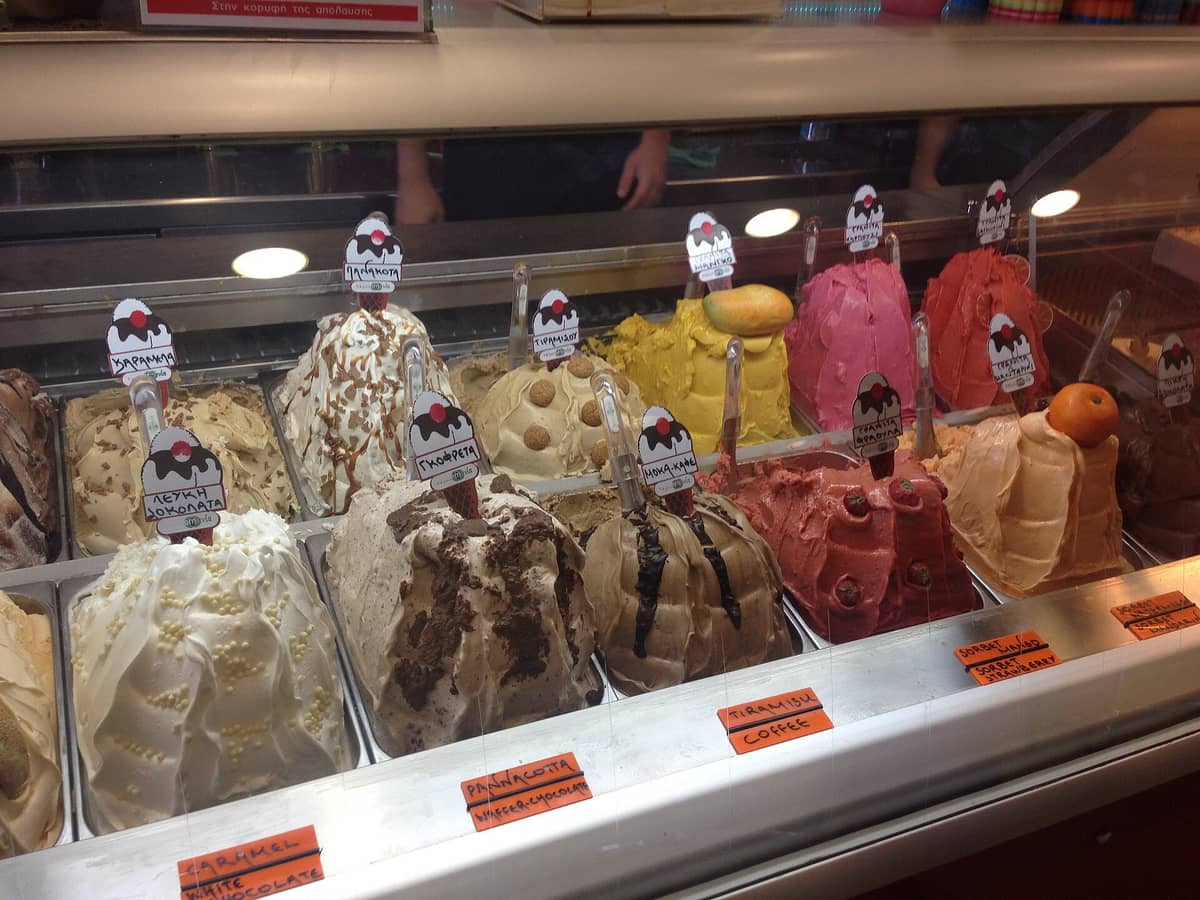 Sweets in Paleochori: trays of Greek ice cream in many flavours in a glass counter, a cold sweet for a summer beach day